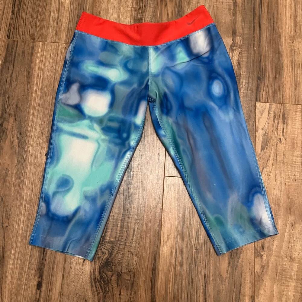 Knee high Nike workout pants.